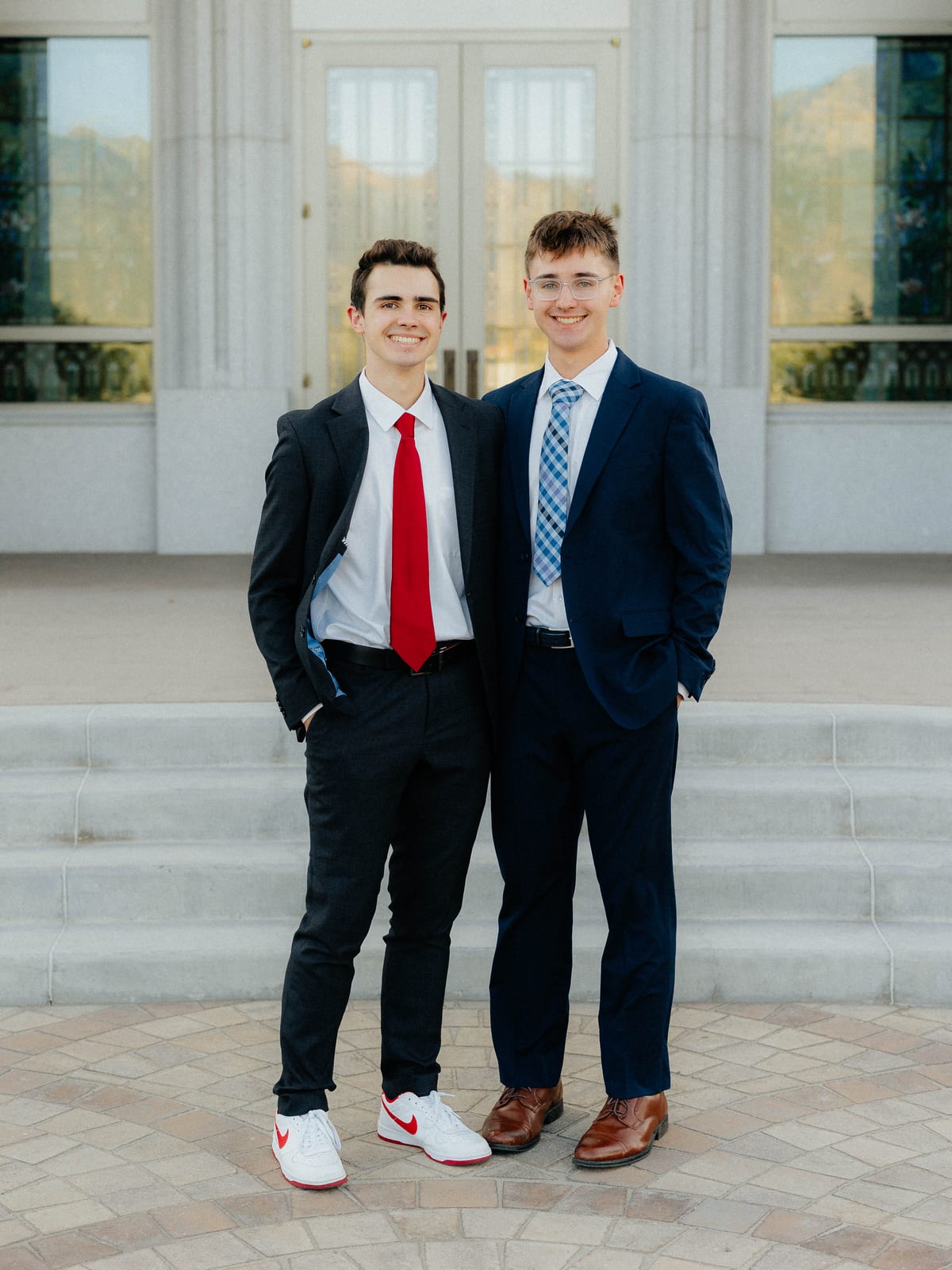 Nixon and Lincoln Bean in suits on the steps of a white stone building